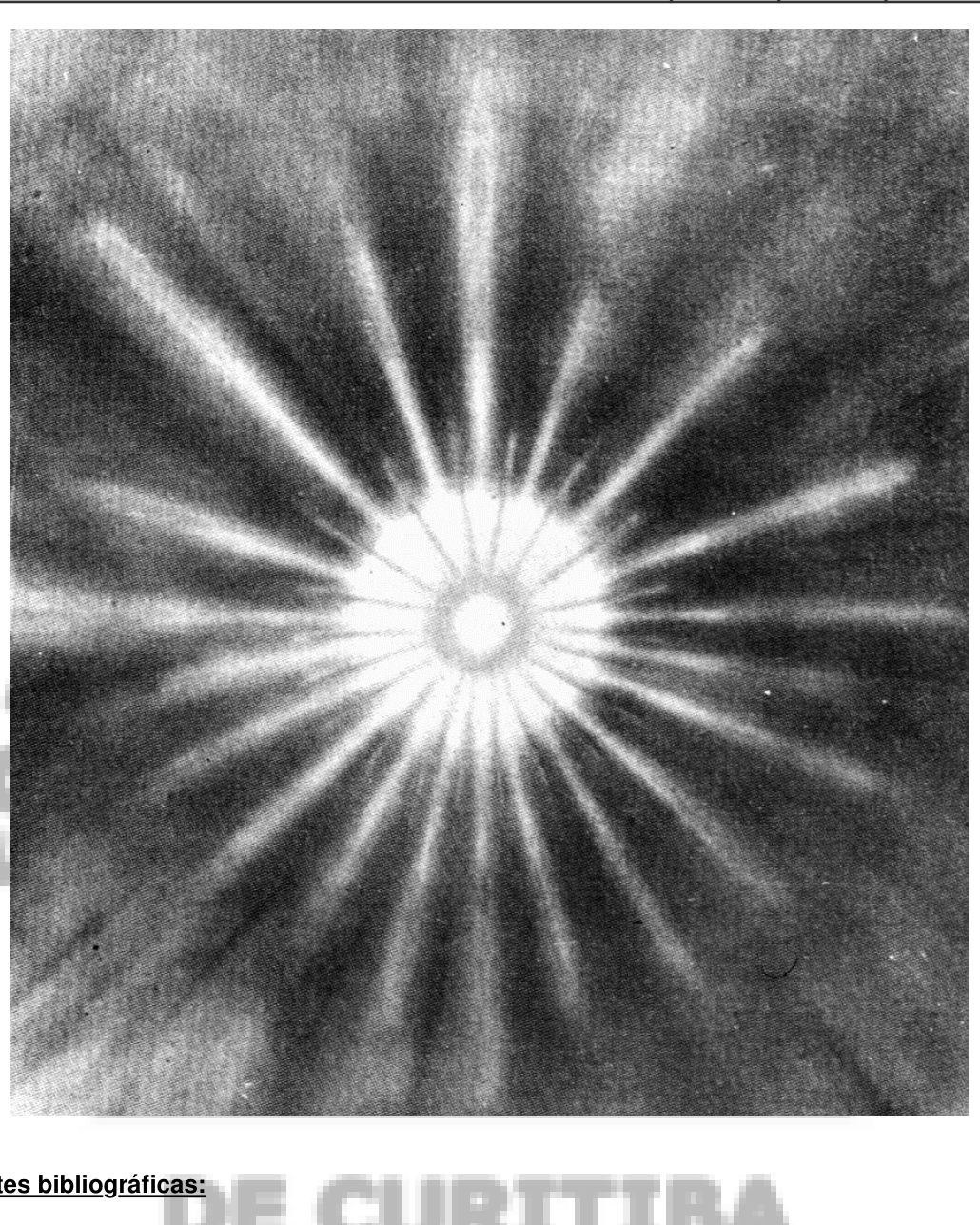 Clarão radiante com uma pequena esfera luminosa ao centro de onde partem raios finos em todas as direções.